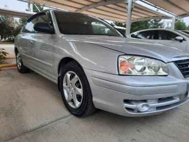 tofas starter: Hyundai Elantra: 1.6 l | 2004 il Sedan — 9