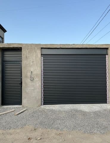kodlu blok qapilari: Bu, qaraj və ya həyət üçün ideal olan rulon qapıdır. Qapı möhkəm — 2