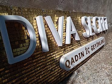 divar paneleri: Məhsul: “DIVA SECRET – QADIN İÇ GEYİMLƏRİ” üçün fasad reklam lövhəsi — 1