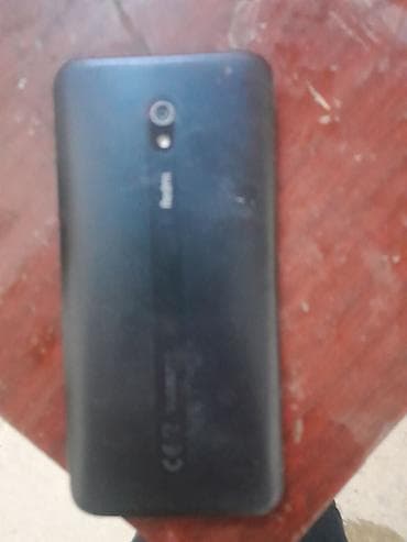 modem sim kartlı: Məhsul: Xiaomi Redmi smartfon Xüsusiyyətlər: - Arxa qapaqda “Redmi” — 1