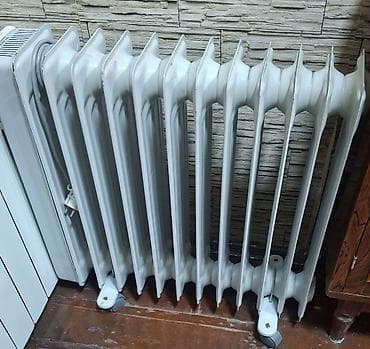 radiator alıram: Ağ rəngli, təkərli, daşınması asan yağlı radiator. Bu radiator rahat — 1