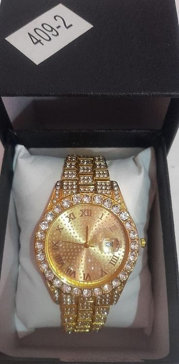 Сумки: Qızılı rəngdə bəzəkli qaşlı qol saatı təzə qutuda. - Korpus və qolbaq — 2