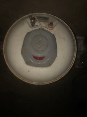 Elektrik su qızdırıcısı (vertikal tip). - Silindrik korpus, ağ rəng