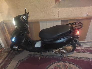 statır: Qara rəngli şəhər skuter/moped bir balaca xerci var 1 gundur surulmur — 6