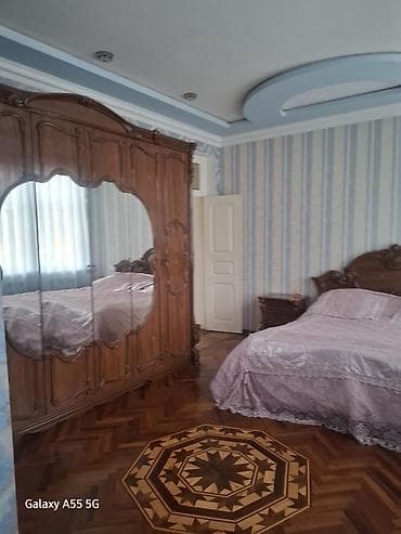 qusar kiraye evler: 2 mərtəbəli geniş mənzil/in - Zal: iri ölçülü, sütunlu tavan dekoru — 10