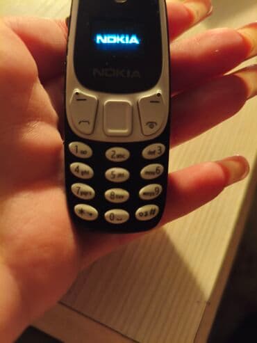 mini android telefonlar: Nokia 1, rəng - Qara, Düyməli — 5