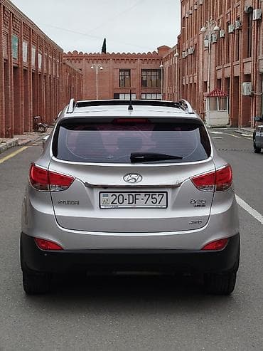 kia caren 2012: Hyundai ix35: 2 l | 2011 il Krossover — 5