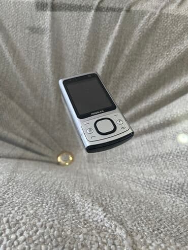Nokia 6700 Slide, rəng - Gümüşü, Zəmanət