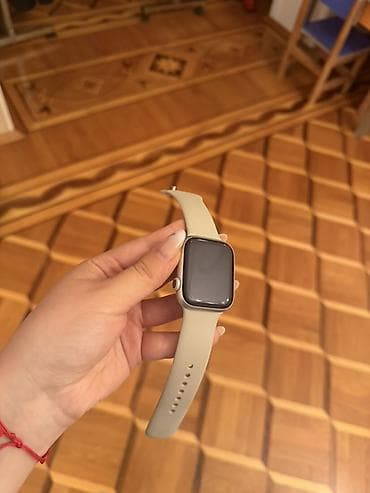 smat: Apple Watch Series 7 45mm satılır. Rəngi: Starlight (açıq rəng) Ölçü — 1