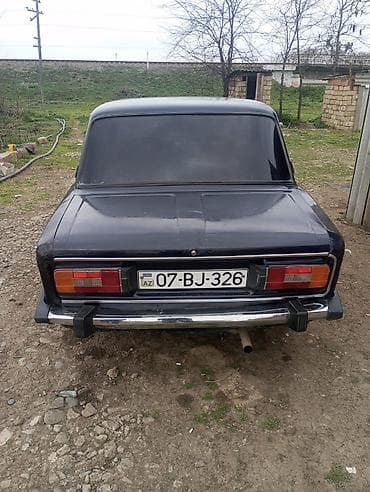 vaz 2106 arxa stop: - Kuzov: 4 qapı, klassik “altılı” dizayn, xrom bamperlər, ön-arka — 2