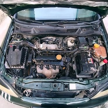 vaz 2107 abirsofka: Opel Astra: 1.6 l | Sedan — 4