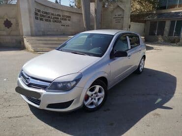 daewoo gentra necə maşındır: Opel Astra H – 5 qapılı hetçbek, gümüşü rəng. - Nömrə: 99 VU 521 - — 4