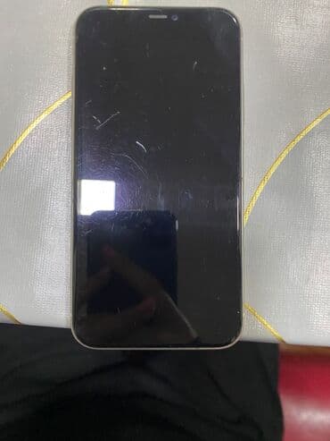 telefon 30: IPhone 11, Ağ, Face ID — 2