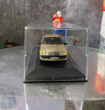 metbex tavan modelleri: Коллекционная модель Mercedes-Benz 190E 2.3 16V W201 gold 1984 EDICOLA — 10