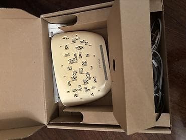 ucuz internet paketleri: TP-Link markasına məxsus Wi-Fi modem satılır. Şəkildə göründüyü kimi — 1