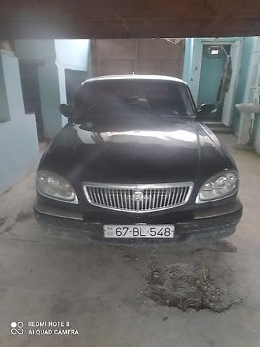 opel 1.5 dizel motor: GAZ-3110 Volga sedan - Kuzov: 4 qapılı sedan, qara rəng - Ön hissə — 5