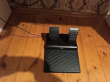komputer hisseleri: PlayStation üçün sükan və pedal dəsti. Rul üzərində PlayStation — 2