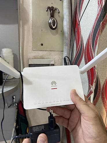 Huawei OptiXstar Wi‑Fi router/modem - İki antenli güclü Wi‑Fi siqnalı