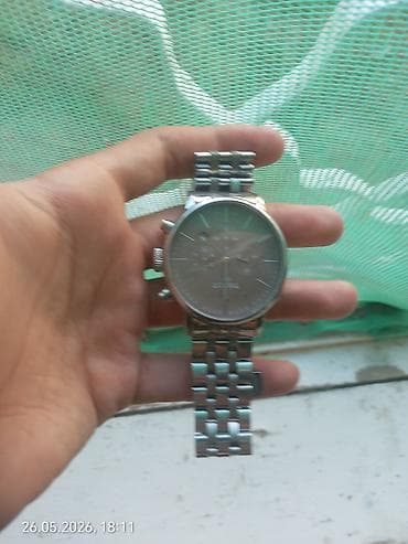 kişi kəməri: Qol saatı, Tissot — 1
