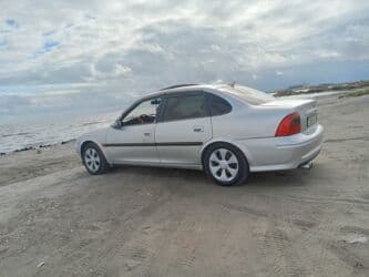 ferrari qiymeti: Opel Vectra: 1.8 l | 1998 il 337000 km Sedan — 2