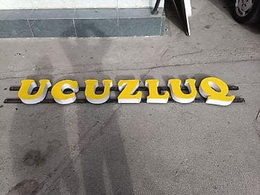 Reklam lövhəsi üçün həcmi hərflər dəsti — “UCUZLUQ” - Material: ön