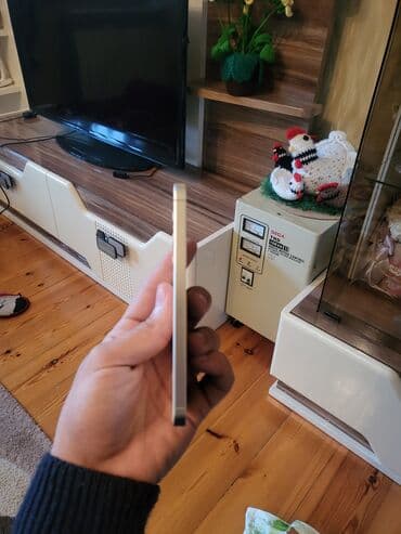 tikanlı tel: Samsung Galaxy S24, 128 GB, rəng - Bej, Simsiz şarj — 8