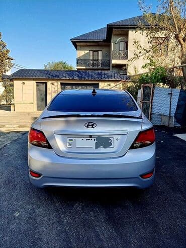 kia sportage 2006: Hyundai Accent: 1.4 l | 2016 il Sedan — 5