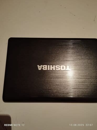 noutbook ekranı: Toshiba Satellite noutbuku Xüsusiyyətlər: - Korpus: qara, fırçalanmış — 1