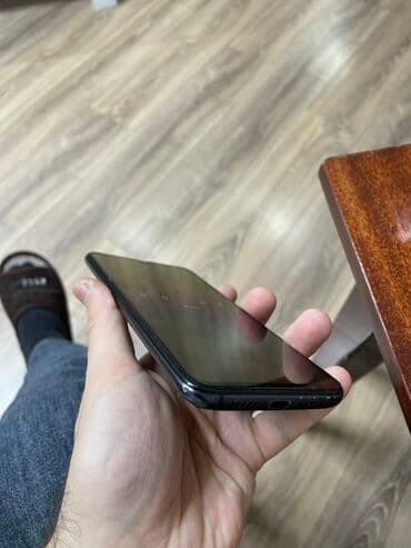 telefin: Smartfon – 6.3” displeyli, damla formalı ön kamera oyuğu olan model — 3