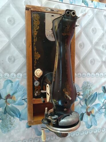 qədimi qəpiklər: Qədim əl tikiş maşını — 3