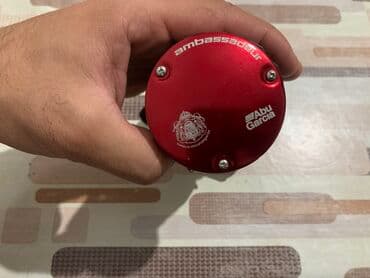 jmıx nədir: Abu Garcia Ambassadeur 6600SX multiplier reels red black. 5.3:1 gear — 10