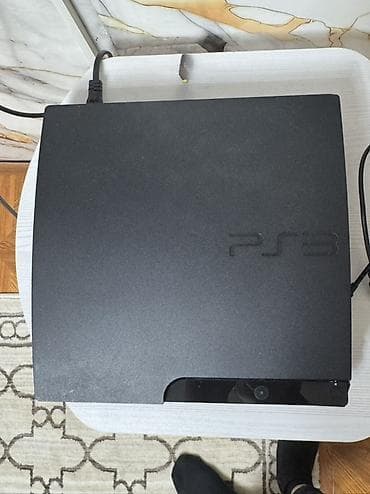 psp 3: PlayStation 3 (PS3) Slim oyun konsolu - Daxili yaddaş: 160 GB (31 GB — 1