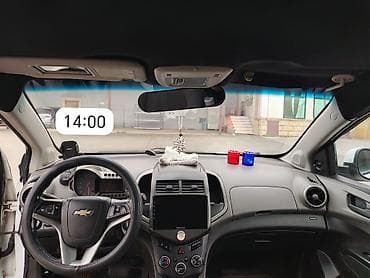 opel astra furqon: Chevrolet Aveo sedan – ağ rəng, şəhər üçün qənaətcil və rahat kompakt — 3