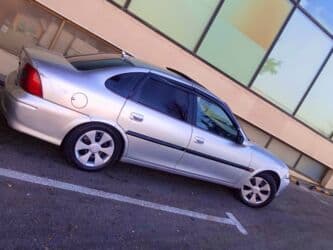 ferrari qiymeti: Opel Vectra: 1.8 l | 1998 il 337000 km Sedan — 1