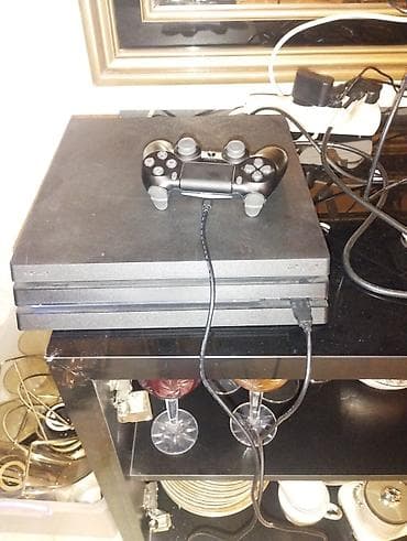 Xbox Series S: Məhsul: Sony PlayStation 4 Pro oyun konsolu + DualShock 4 idarəetmə — 2