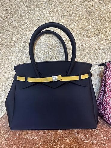 Çantalar: Italiya markasi 135 avroya alinib, 80 azn satilir — 1