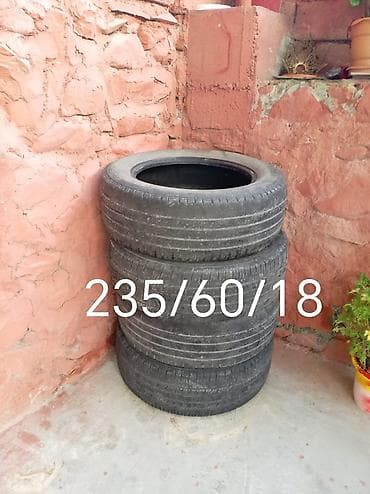mercedes benz w201: 50 manata satilir 235/60/18 e teker — 1