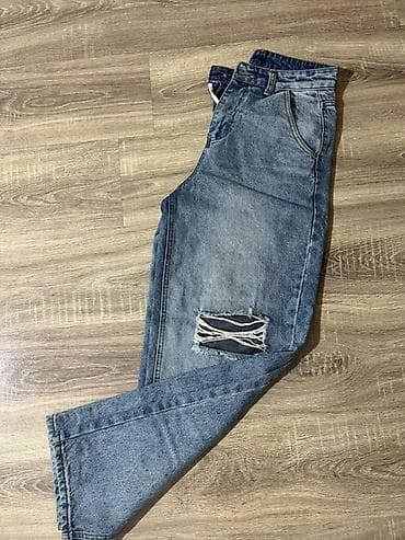 Geniş kəsimli, daş yuyulmuş effektli mavi džins şalvar. - MateriaI