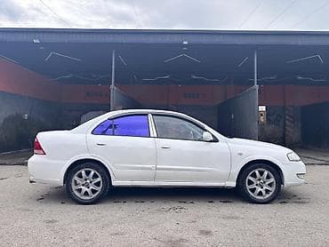 klas 6: Nissan Sunny: 1.6 l | 2007 il Sedan — 4