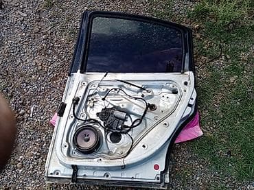 avtomobiller: Sol arxa, Volkswagen passat b5, 1999 il, ABŞ, Ünvandan götürmə — 2