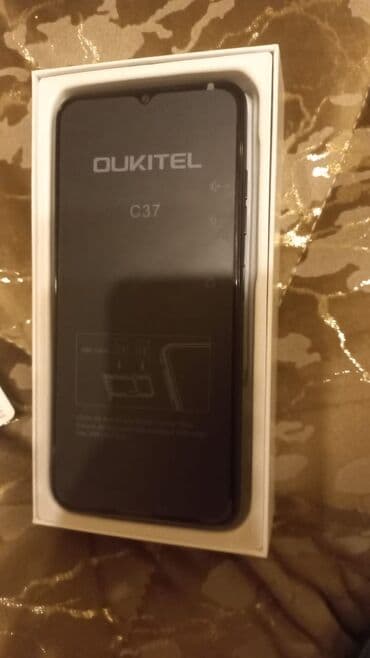 телефон fly cirrus 9: OUKITEL C37 smartfon - Ekran: 6.6 düym FHD+ - Şəbəkə: 4G - — 3