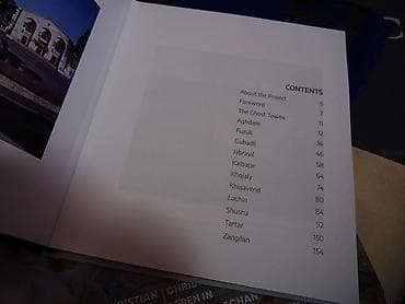 Reza Deqatinin fotoları əsasında 2024-cü ildə nəşr edilmiş "Dağıdılmış — 3