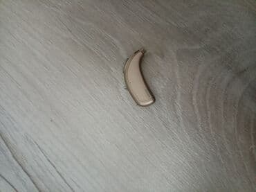 Tibbi geyim: Qulaq arxası eşitmə aparatı - Tip: BTE (behind-the-ear) eşitmə cihazı — 1