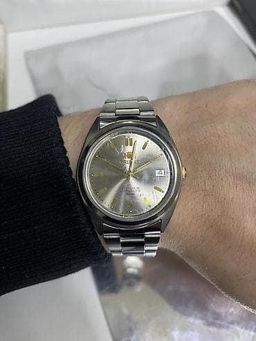 elektron saat oyrənmək: İşlənmiş, Qol saatı, Orient, rəng - Gümüşü — 1