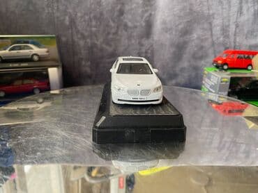 metbex tavan modelleri: Коллекционная модель BMW 750i F02 white 2008 RASTAR Scale 1:43 Art — 8