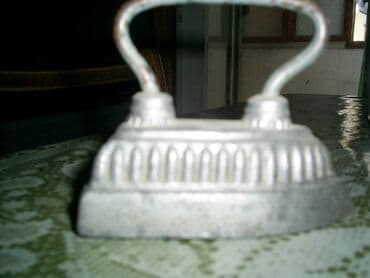 Antik uşaq ütüsü