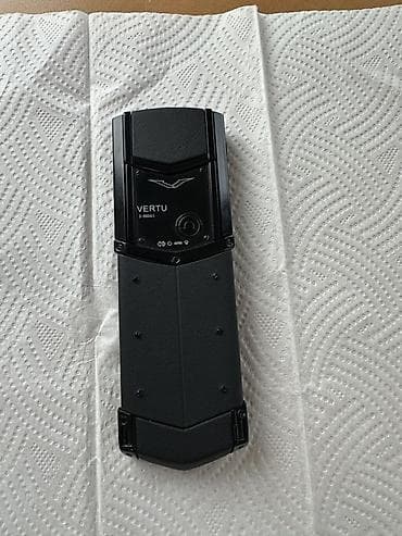 philips xenium 9@9d: Vertu rəng - Qara, Düyməli — 2