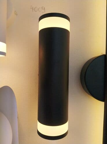 spot işıqlar qiyməti: Qara rəngdə, silindrik formalı divar lampası. Yuxarı və aşağı — 1