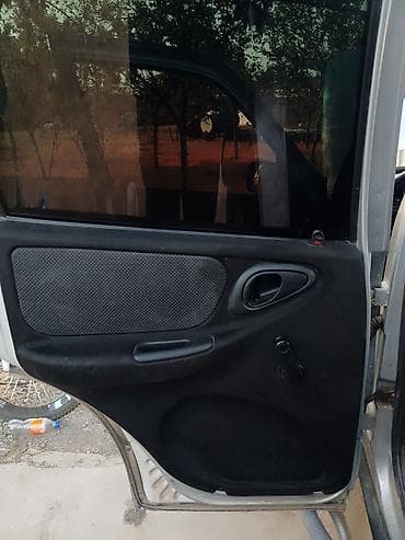 panel ortuyu: Chevrolet Niva: 1.7 l | 2012 il 213000 km Krossover — 10
