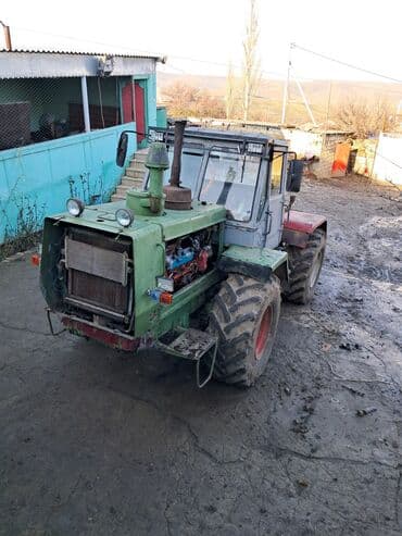 инвертор с 12 на 220 вольт: Yaşıl rəngdə olan bu traktor təsərrüfat işləri üçün yararlıdır. Kənd — 4